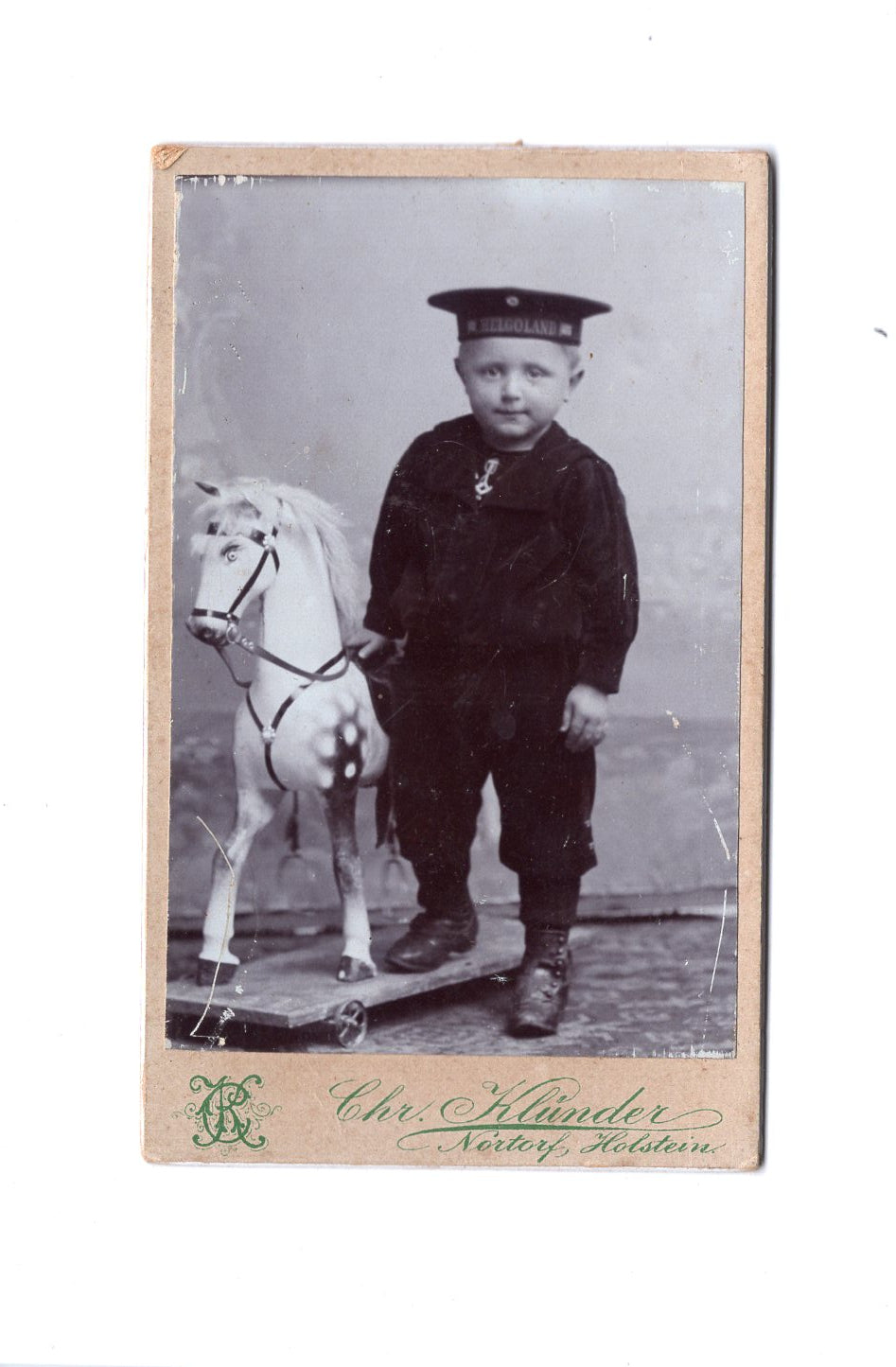 Fotografie Niedlicher kleiner Junge mit Schaukelpferd - Nortorf um 1900